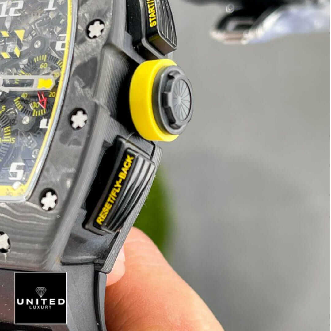 Richard Mille RM 11-03 Richard Mille Carbon Black Bezel Yellow Crown Replica on the hand