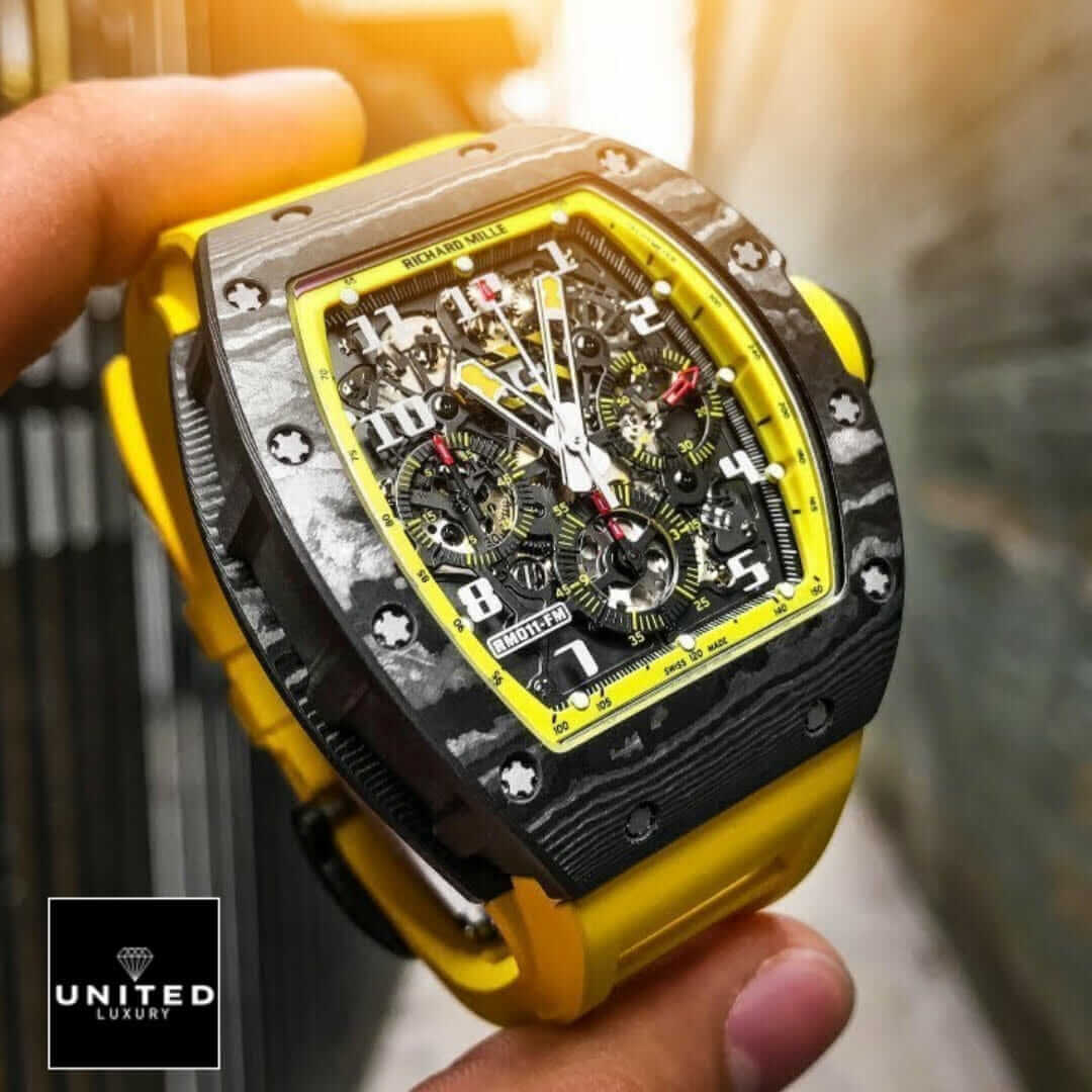 Richard Mille RM 11-03 Richard Mille Black Bezel Yellow Bracelet Replica on the hand