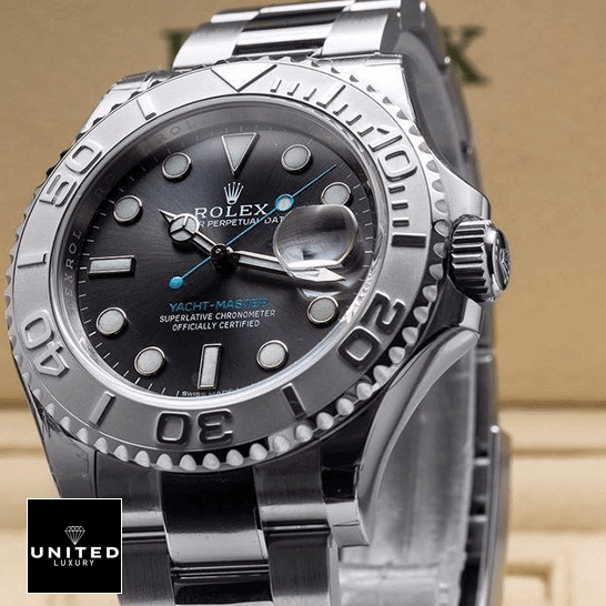 Rolex Yacht Master 116622-0003 Replica push button and brown background